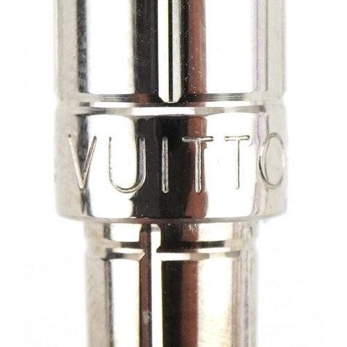 184 - Louis Vuitton retractable ballpoint mini bag pen housed in a Louis Vuitton box, 9cm in length