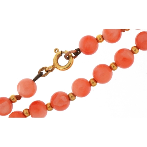 3235 - Pink coral bead necklace with 9ct gold clasp, 40cm in length, 13.5g