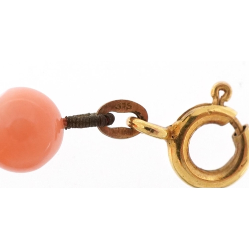 3235 - Pink coral bead necklace with 9ct gold clasp, 40cm in length, 13.5g