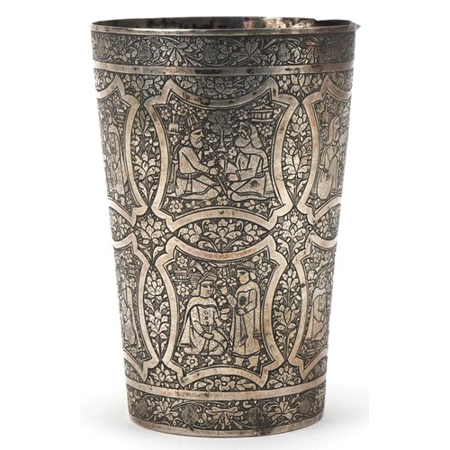 419 - Middle Eastern silver beaker profusely engraved with panels of figures presenting gifts amongst foli... 