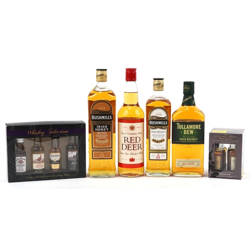 599 - Four bottles of whisky and six whisky miniatures including Tallamore Dew Irish whisky and Red Deer C... 