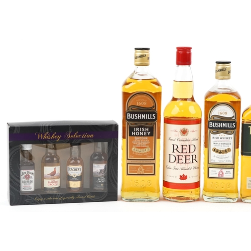 599 - Four bottles of whisky and six whisky miniatures including Tallamore Dew Irish whisky and Red Deer C... 