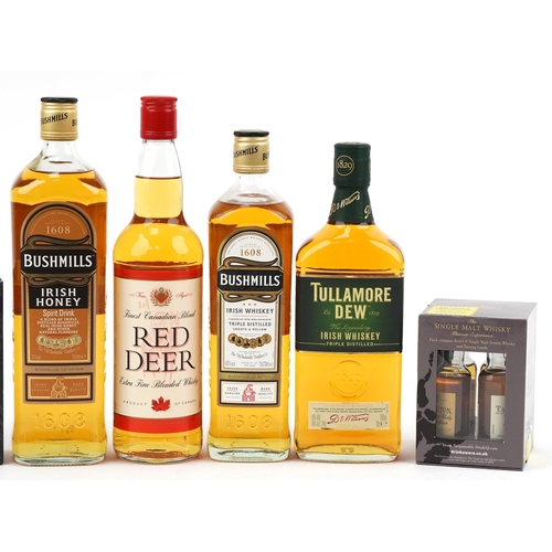 599 - Four bottles of whisky and six whisky miniatures including Tallamore Dew Irish whisky and Red Deer C... 