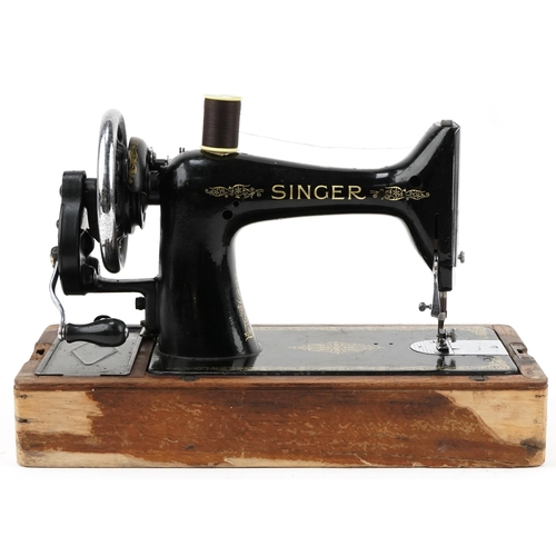 1193 - Vintage black enamel Singer sewing machine numbered EG824743, 44cm in length (recently serviced)