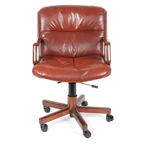 1053 - Vaghi mid century Italian laminated wood and oxblood leather desk chair, 95cm high