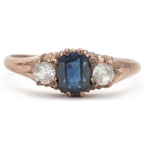 3229 - Unmarked gold sapphire and clear stone three stone ring, size N/O, 2.0g