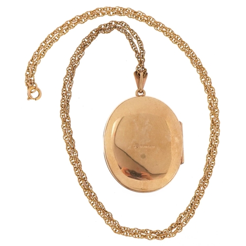 3021 - 9ct gold oval locket engraved with a swan on a lake on a 9ct gold multi link necklace, 4cm high and ... 