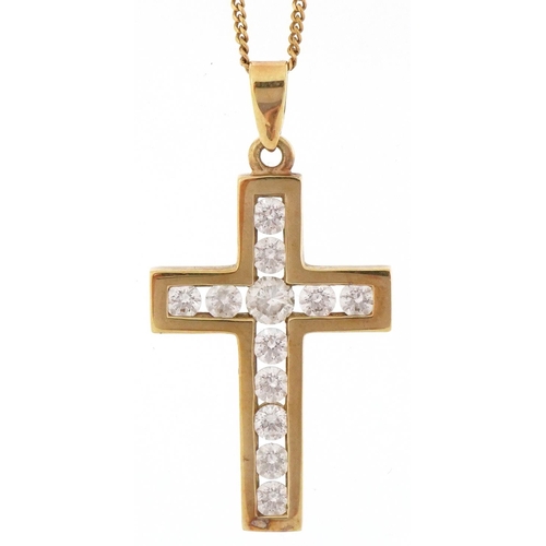 3028 - 9ct gold clear stone cross pendant on a 9ct gold necklace housed in a Beaverbrook jeweller's box, 3.... 