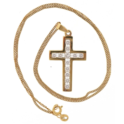 3028 - 9ct gold clear stone cross pendant on a 9ct gold necklace housed in a Beaverbrook jeweller's box, 3.... 