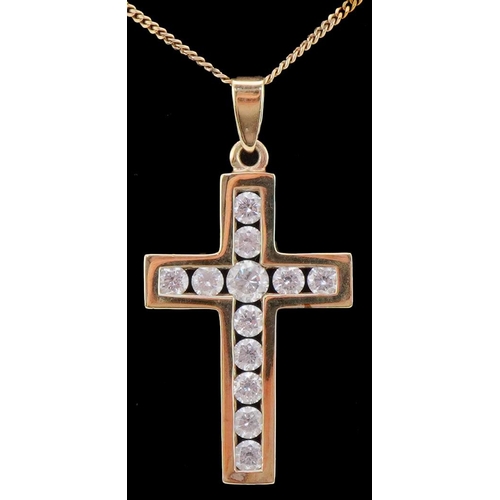 3028 - 9ct gold clear stone cross pendant on a 9ct gold necklace housed in a Beaverbrook jeweller's box, 3.... 