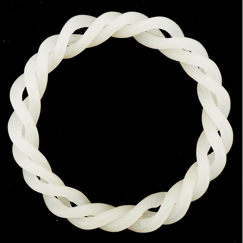 3055 - Chinese white jade two section entwined bangle, 8cm in diameter, 30.5g