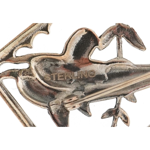 3223 - Modernist sterling silver brooch in the form of two leaping dolphins, 3.2cm wide, 9.8g