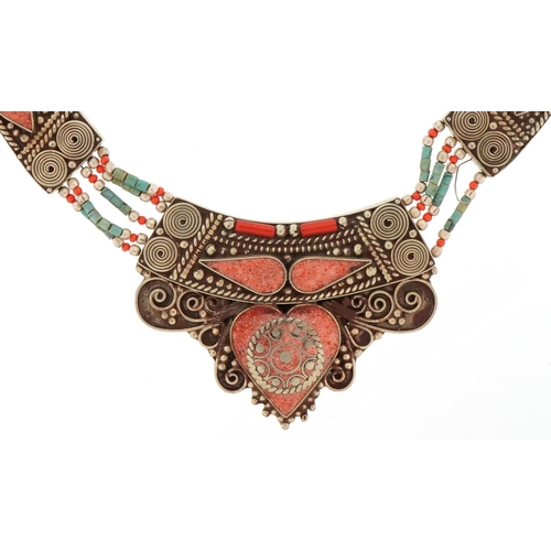 3338 - Indian white metal necklace set with turquoise and coral coloured stones, 50cm in length, 138.0g