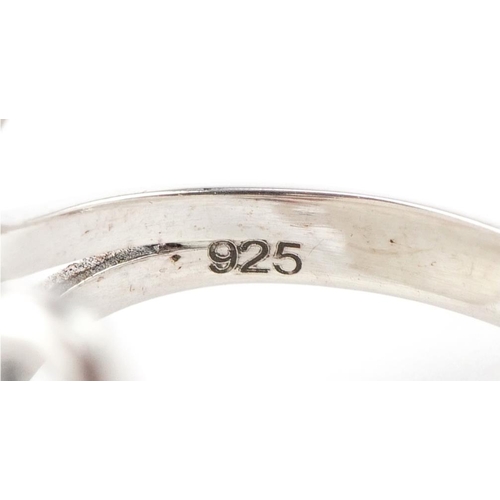 3241 - Silver ring in the form of a coffin opening to reveal a skeleton, size N, 13.5g