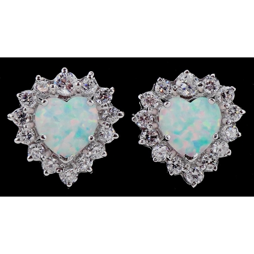 3307 - Pair of silver stud earrings in the form of love hearts set with opals and clear stones, 1.8cm high,... 