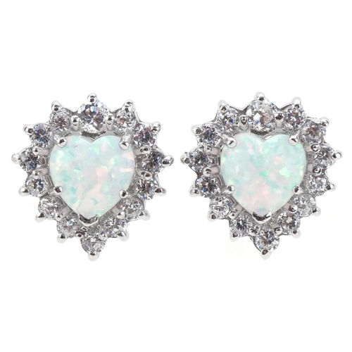 3307 - Pair of silver stud earrings in the form of love hearts set with opals and clear stones, 1.8cm high,... 