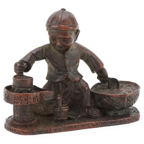 363 - Chinese patinated bronze study of a child street food seller, 7.5cm in length