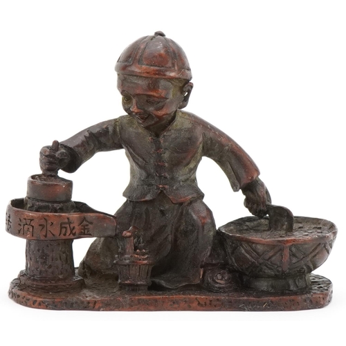 363 - Chinese patinated bronze study of a child street food seller, 7.5cm in length