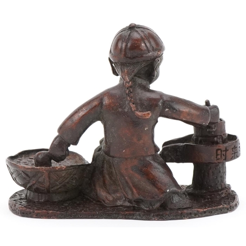 363 - Chinese patinated bronze study of a child street food seller, 7.5cm in length