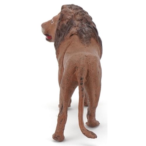 1399 - After Franz Xaver Bergmann, cold painted bronze study of a lion, 9.5cm in length