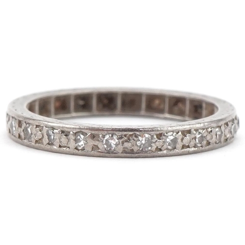 3024 - Unmarked white gold diamond eternity ring, size N, 3.0g