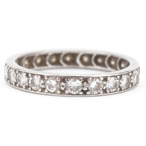 3034 - Unmarked white metal diamond eternity ring, each diamond approximately 2.0mm in diameter, size N, 2.... 