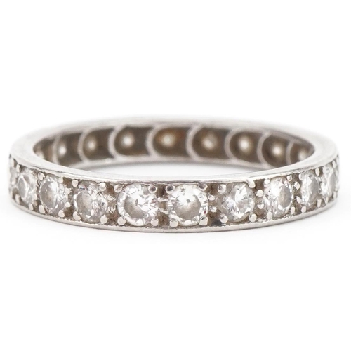 3034 - Unmarked white metal diamond eternity ring, each diamond approximately 2.0mm in diameter, size N, 2.... 