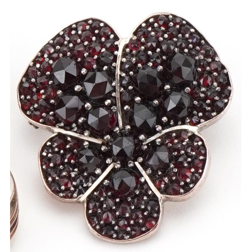 3281 - Two vintage Bohemian garnet brooches and a 9ct gold seed pearl and pink stone ring, size N, the ring... 