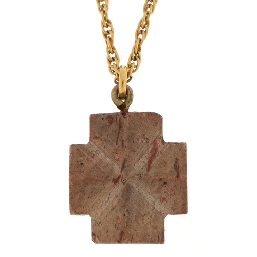 3328 - Petrified wood cross pendant on a yellow metal multi link necklace, 1.5cm high and 44cm in length, t... 