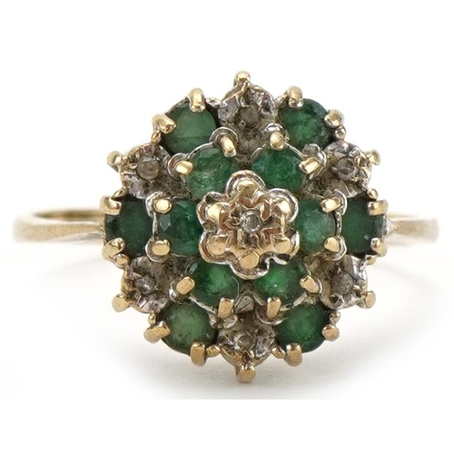 3115 - 9ct gold diamond and emerald three tier cluster ring, size O, 2.6g