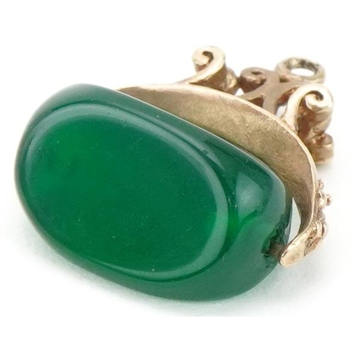 3189 - Antique unmarked gold emerald spinner fob, 2cm high, 2.8g