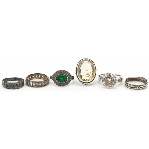 3286 - Six silver rings, some set with semi precious stones, including two eternity rings and a large citri... 