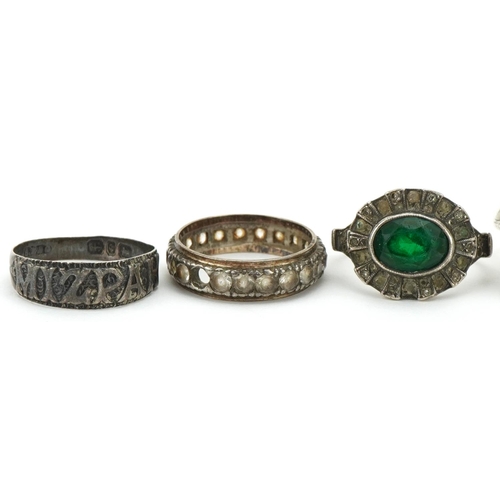 3286 - Six silver rings, some set with semi precious stones, including two eternity rings and a large citri... 