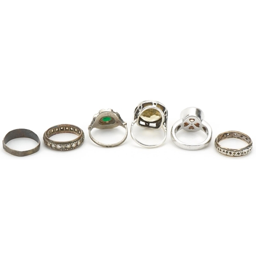 3286 - Six silver rings, some set with semi precious stones, including two eternity rings and a large citri... 