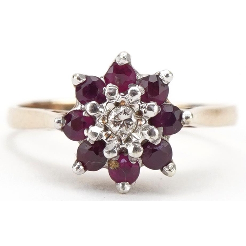 3219 - 9ct gold diamond and pink spinel flower head ring, size O, 2.3g