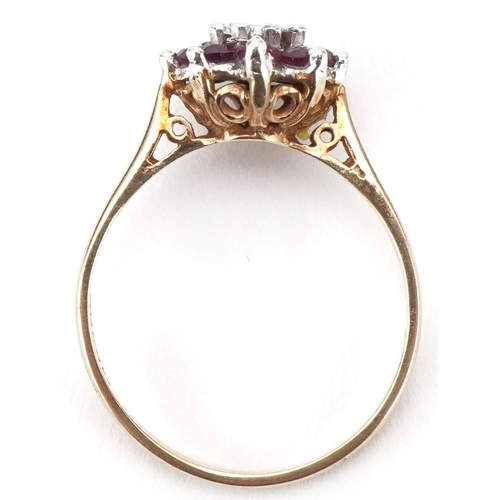 3219 - 9ct gold diamond and pink spinel flower head ring, size O, 2.3g