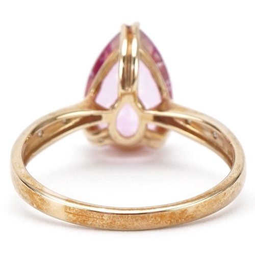 3167 - 9ct gold pink topaz teardrop ring with diamond set shoulders, size N, 2.7g