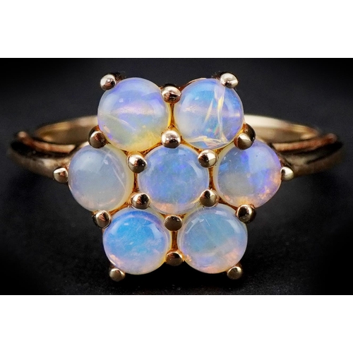 3264 - 9ct gold opal flower head ring, size O, 2.3g