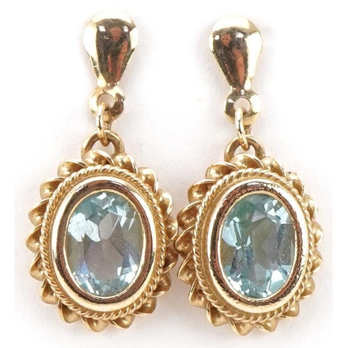 3072 - Pair of unmarked gold blue topaz drop earrings, 2.1cm high, total 2.3g