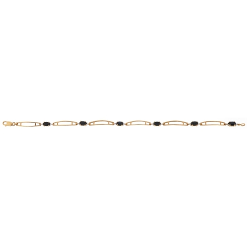 3064 - 9ct gold openwork sapphire and diamond bracelet, 17cm in length, 3.2g