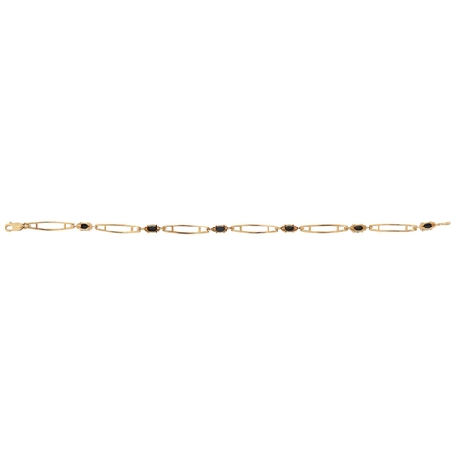 3064 - 9ct gold openwork sapphire and diamond bracelet, 17cm in length, 3.2g