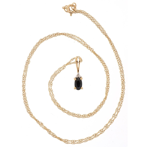 3134 - 9ct gold blue spinel and diamond pendant on a 9ct gold necklace, 1.3cm high and 44cm in length, tota... 