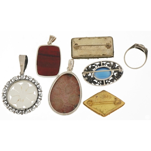 3301 - Six vintage and later brooches and pendants, some silver mounted including micro mosaic brooches and... 