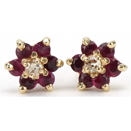 3188 - Pair of unmarked gold diamond and pink spinel flower head stud earrings, 5.5mm in diameter, 0.7g