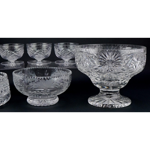 1146 - Group of cut glass vases, bowls and dessert dishes, the largest vase 31cm high