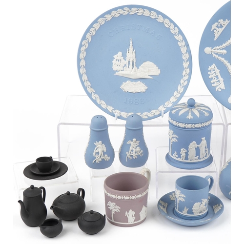 524 - Group of Wedgwood Jasperware to include a salt and pepper, mug and saucer, bottleneck vase, jar and ... 