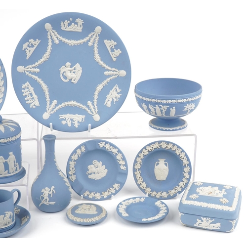 524 - Group of Wedgwood Jasperware to include a salt and pepper, mug and saucer, bottleneck vase, jar and ... 