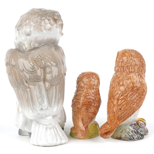 518 - Two Beswick models of owls, the largest 12cm, together with a Nao figure of an owl, 18cm high