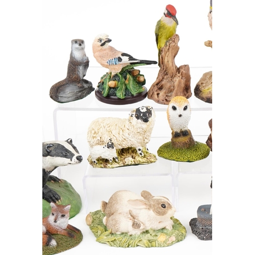 1142 - Small collection of various hand painted resin figures of birds and animals to include a badger, rab... 