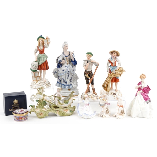 525 - Group of three Goebel porcelain figures together with a pair of Goebel porcelain figures of cherubs ... 